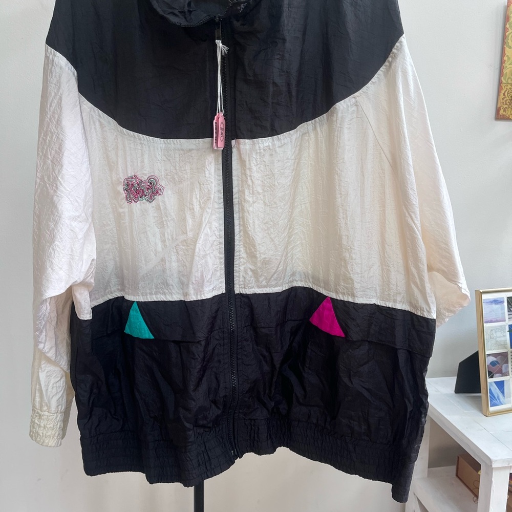 Chic Black and White Bomber Jacket with Pink and Teal Details